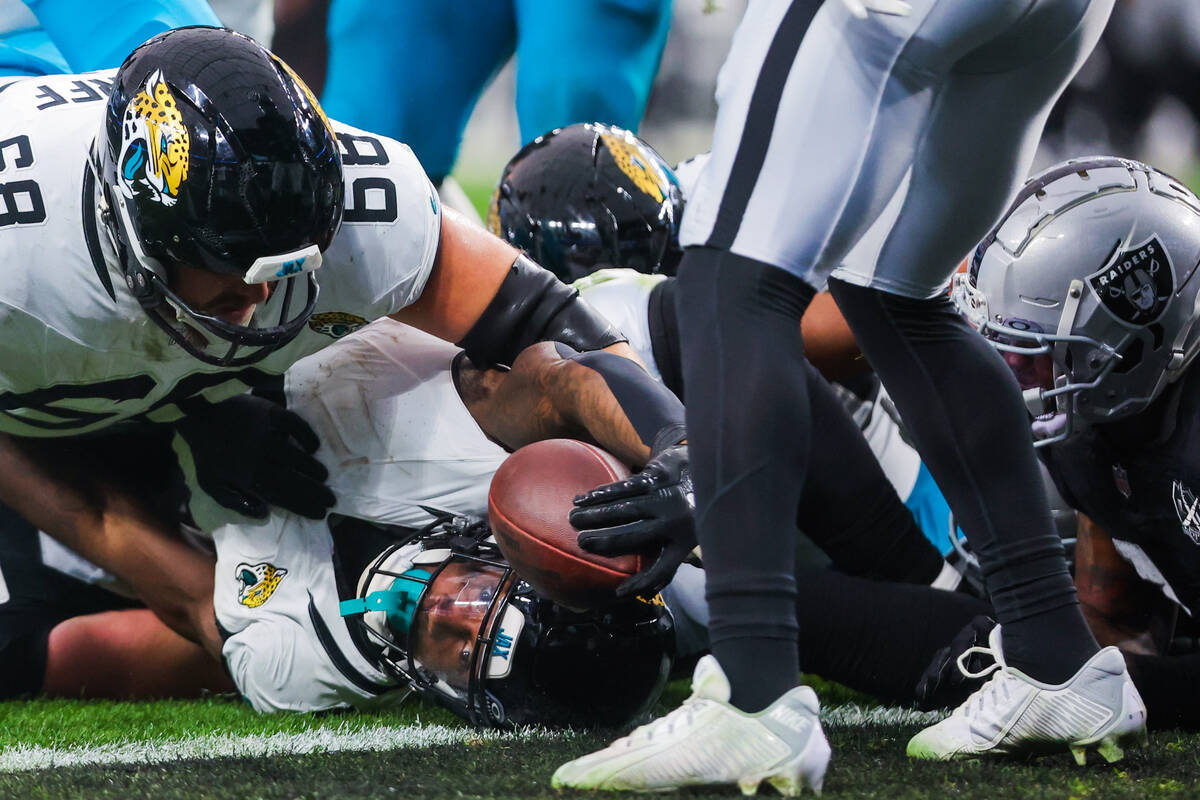 The Jacksonville Jaguars just barely miss a touchdown during an NFL football game between the R ...