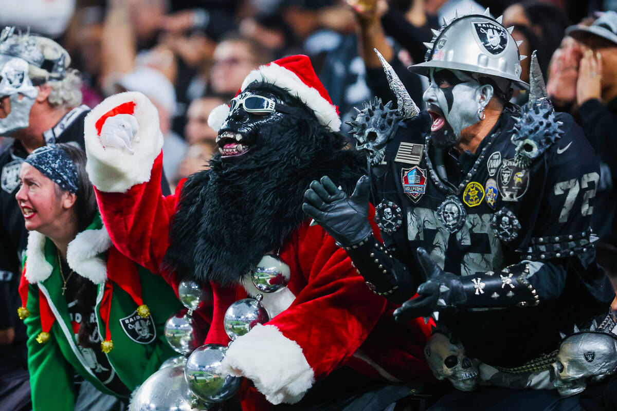 Raiders fans cheer during an NFL football game between the Raiders and the Jacksonville Jaguars ...