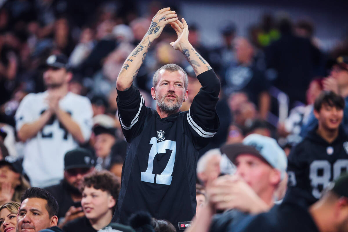 A Raiders fan cheers during an NFL football game between the Raiders and the Jacksonville Jagua ...