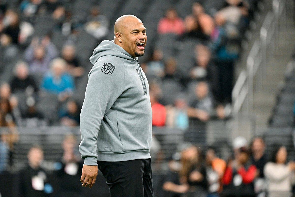 Las Vegas Raiders head coach Antonio Pierce shouts instructions on the field during the first h ...