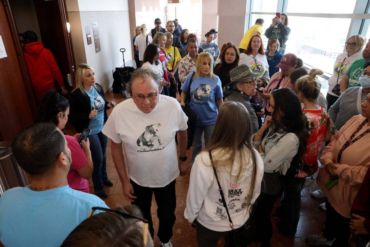 Supporters of Reba the bulldog gather outside of court at the Regional Justice Center in Las Ve ...