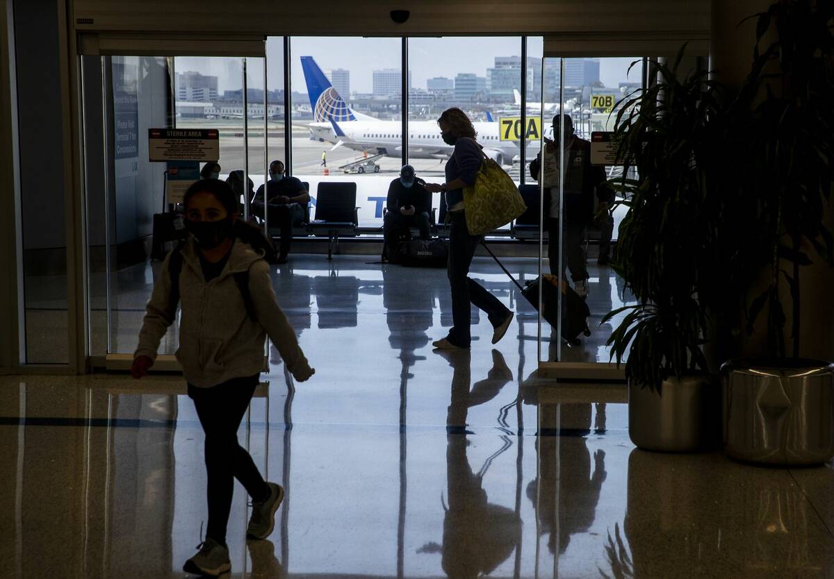 A TSA officer flagged a woman’s bag during a routine X-ray screening at Los Angeles Inte ...