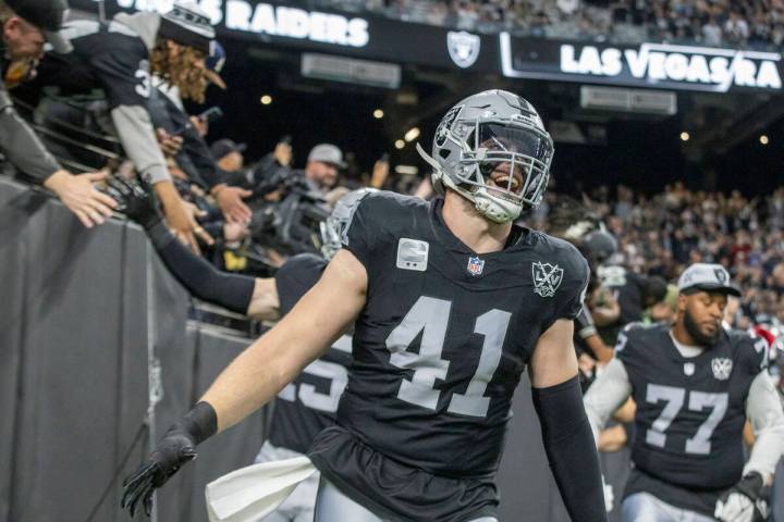 Raiders linebacker Robert Spillane (41) takes the field as the team is introduced before an NFL ...