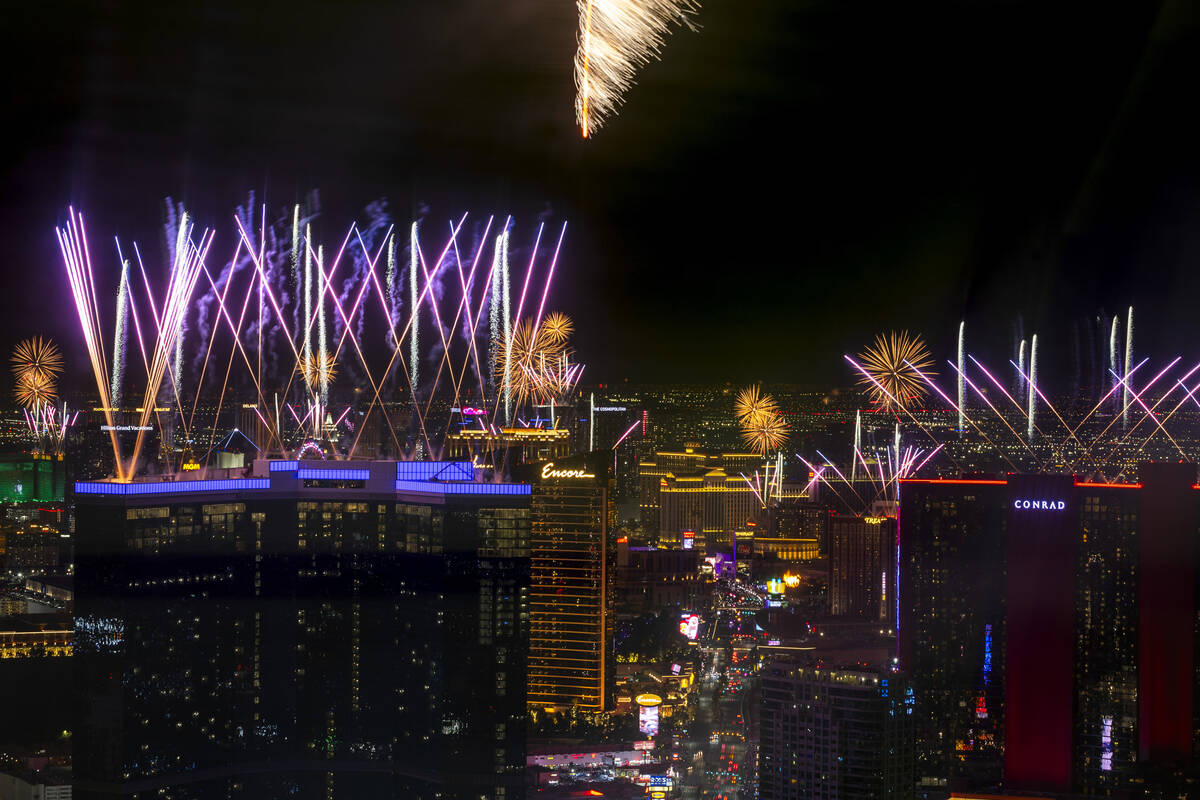 Fireworks erupt over the Las Vegas Strip as part of New Years Eve festivities across the city f ...