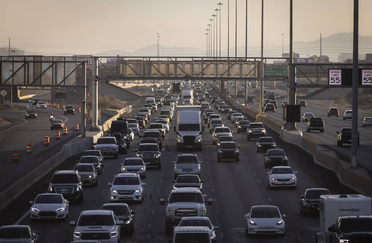 Traffic backs up along Interstate 15 as tourists arrive in Las Vegas ahead of the New Year&#x20 ...