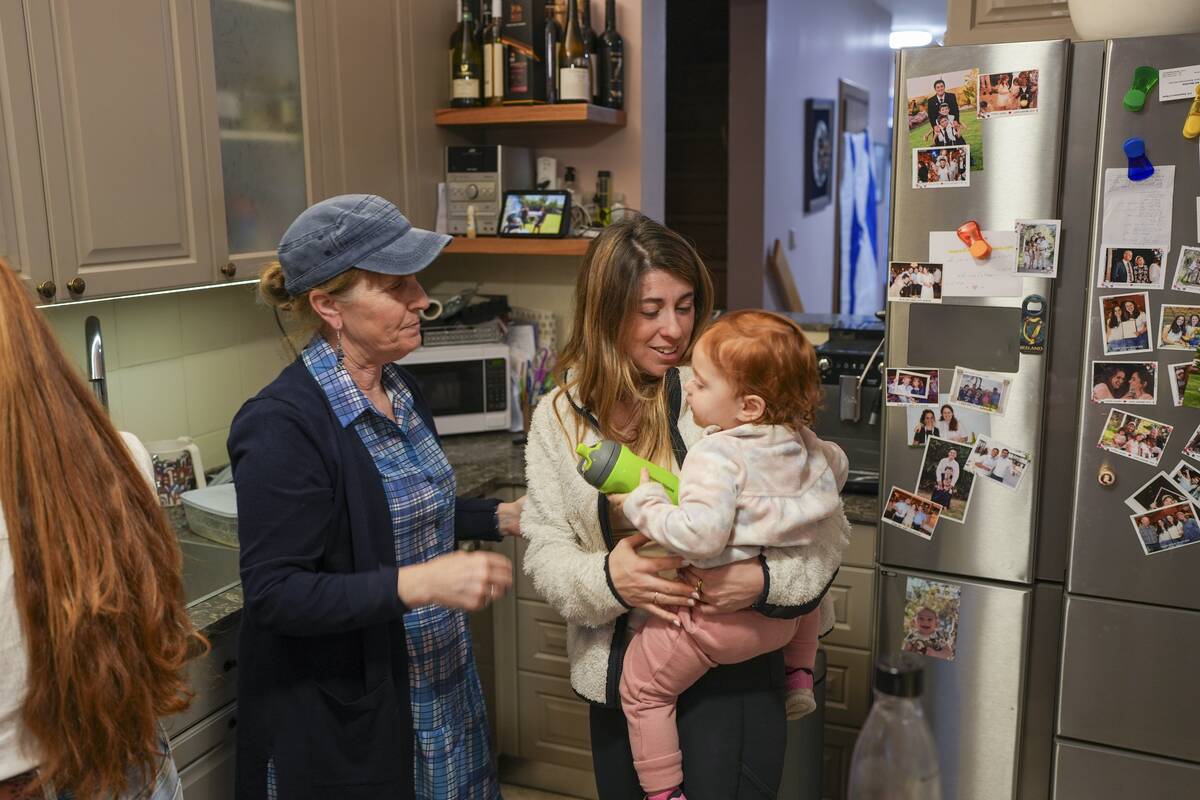 Hazel Brief looks at her daughter and granddaughter at their home in Modiin, Israel, Dec. 8, 20 ...