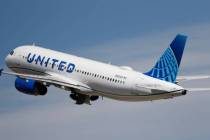 A United Airlines jetliner lifts off from a runway at Denver International Airport on June 10, ...