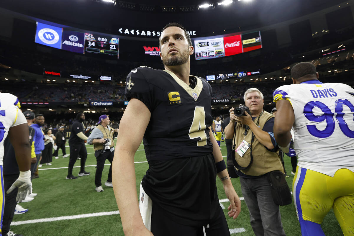 New Orleans Saints quarterback Derek Carr (4) walks off the field after an NFL football game ag ...