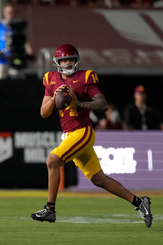 Southern California quarterback Jayden Maiava gets set to pass during the second half of an NCA ...