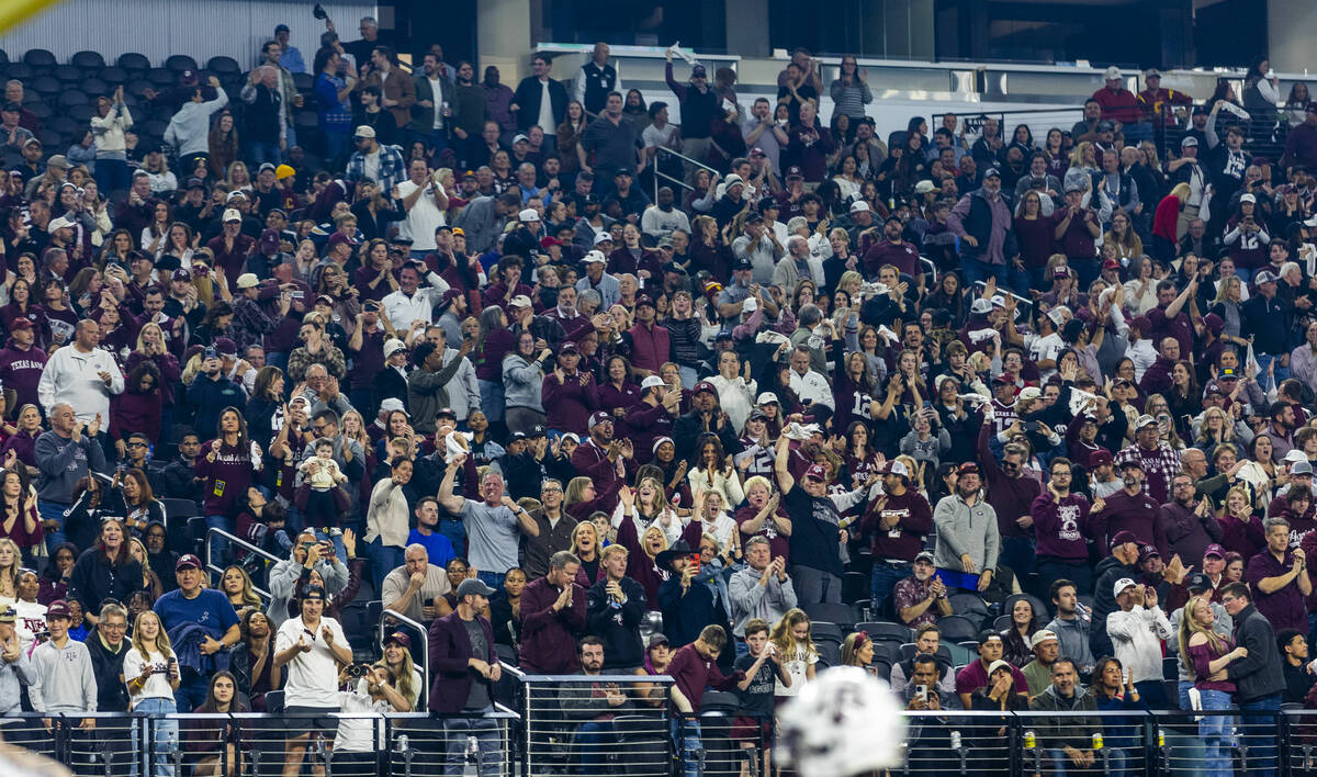 Texas A&M Aggies fans cheer on their team against the USC Trojans during the first half of ...