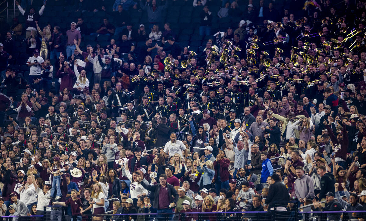 Texas A&M Aggies fans celebrate a score against the USC Trojans during the first half of th ...