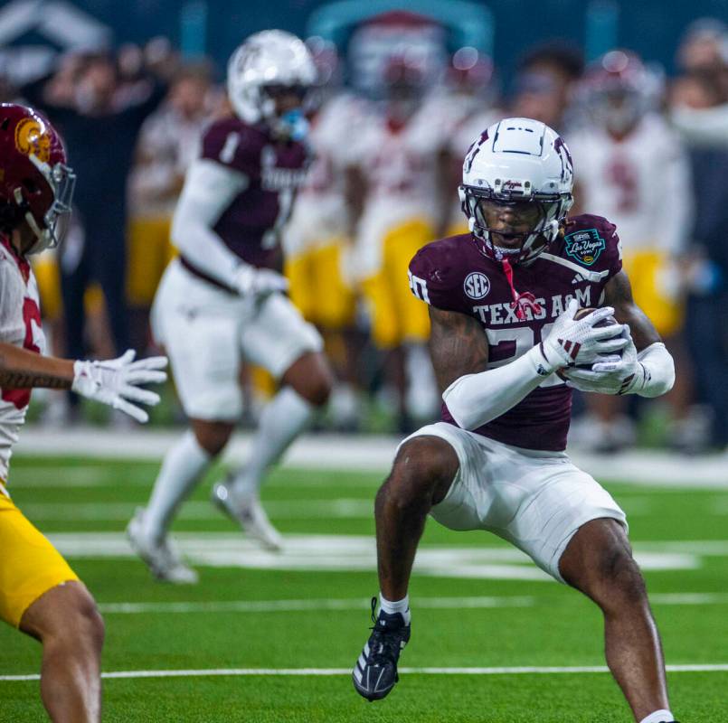 Texas A&M Aggies defensive back BJ Mayes (20) intercepts a pass intended for USC Trojans wi ...