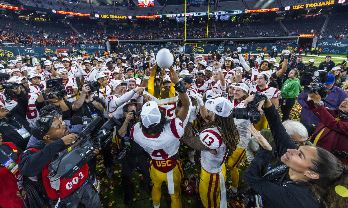 The USC Trojans celebrate their win over the Texas A&M Aggies following their Las Vegas Bow ...