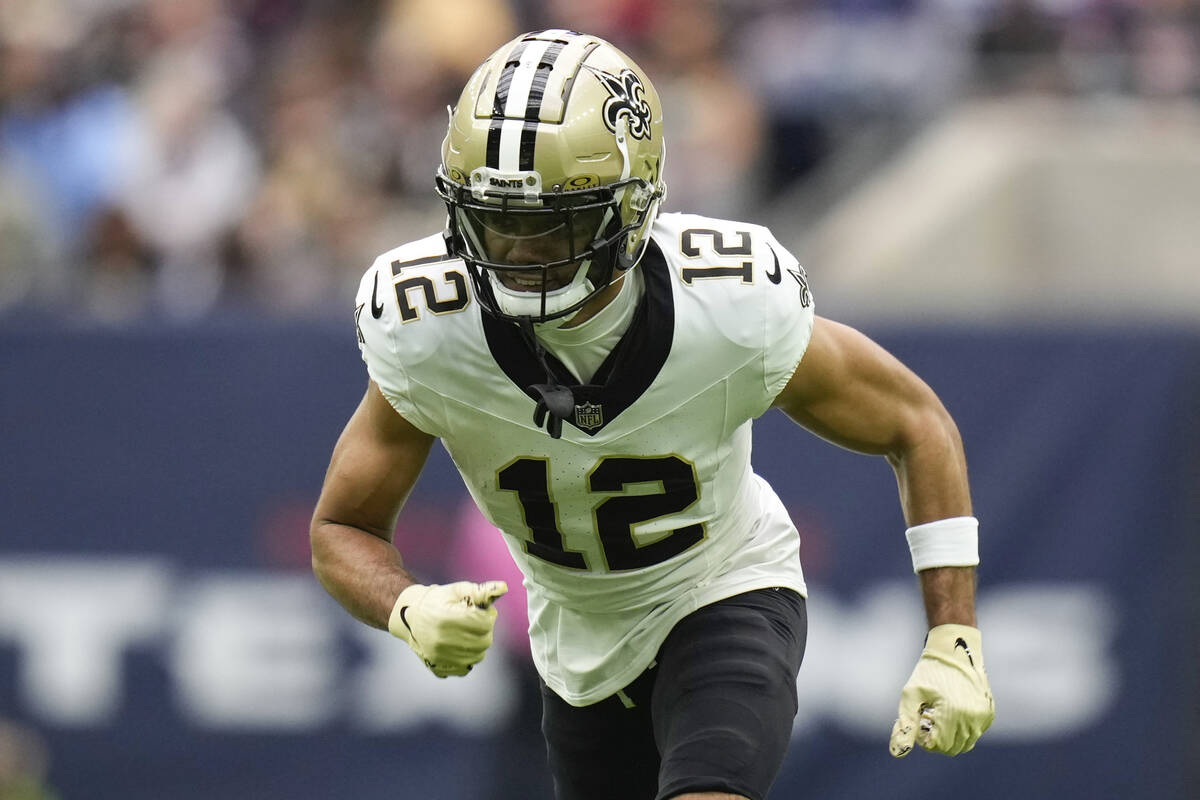 New Orleans Saints wide receiver Chris Olave (12) plays during the first half of an NFL footbal ...