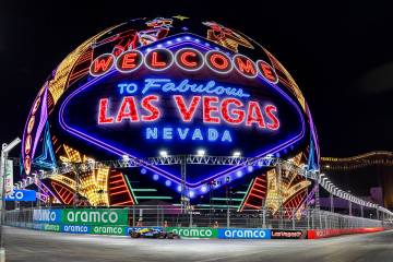 A race car navigates around the Sphere during the qualifying round for the Formula 1 Las Vegas ...