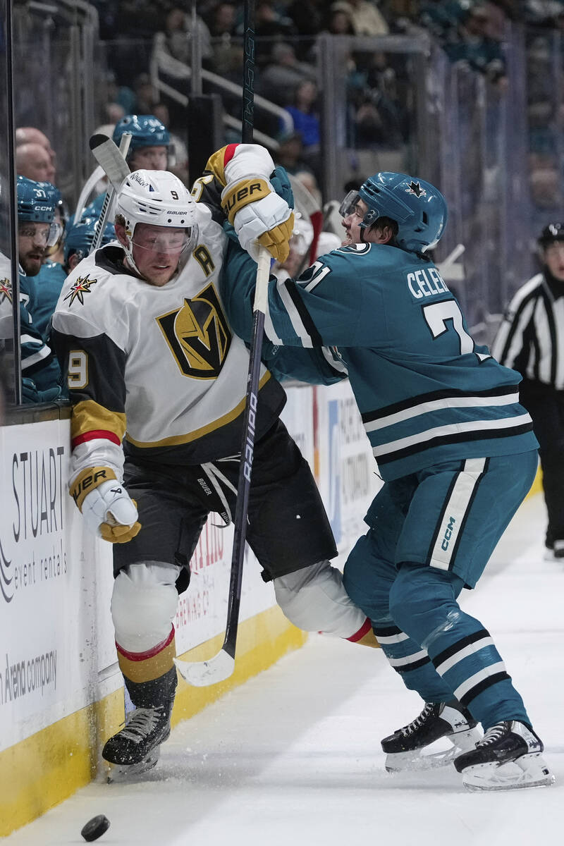 San Jose Sharks center Macklin Celebrini, right, fouls Vegas Golden Knights center Jack Eichel ...