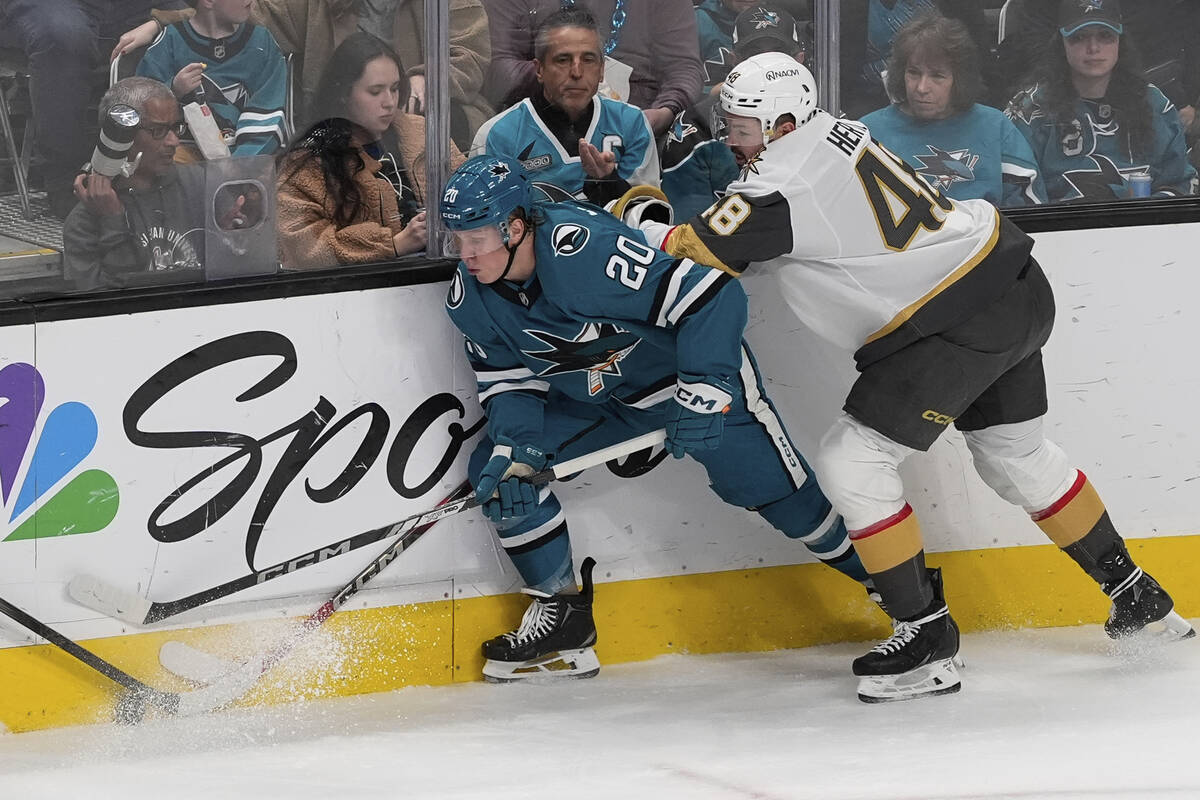 San Jose Sharks left wing Fabian Zetterlund (20) and Vegas Golden Knights center Tomas Hertl, r ...