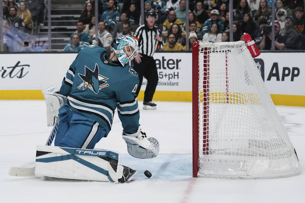 San Jose Sharks goaltender Alexandar Georgiev stops a shot against the Vegas Golden Knights dur ...