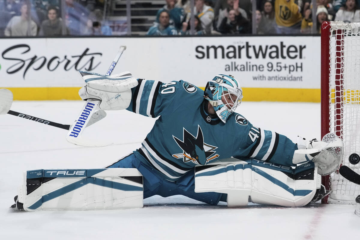 San Jose Sharks goaltender Alexandar Georgiev (40) deflects a shot against the Vegas Golden Kni ...