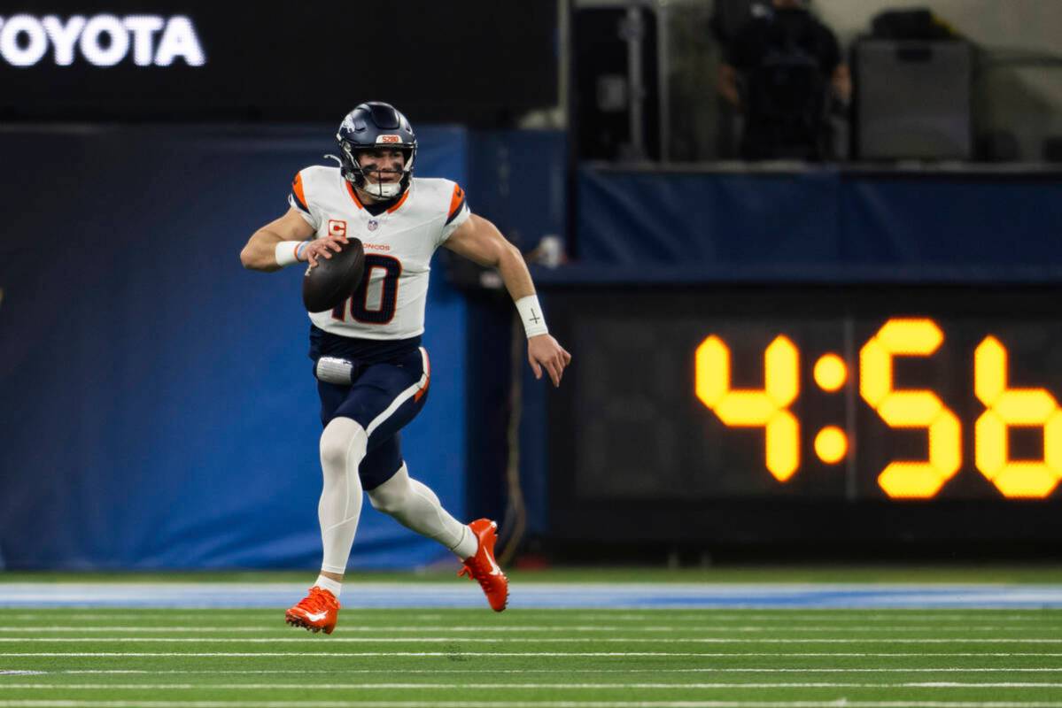 Denver Broncos quarterback Bo Nix (10) runs with the ball during an NFL football game against t ...