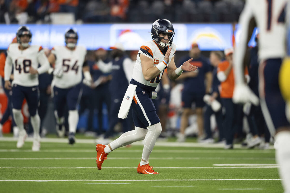 Denver Broncos quarterback Bo Nix (10) reacts during an NFL football game against the Los Angel ...