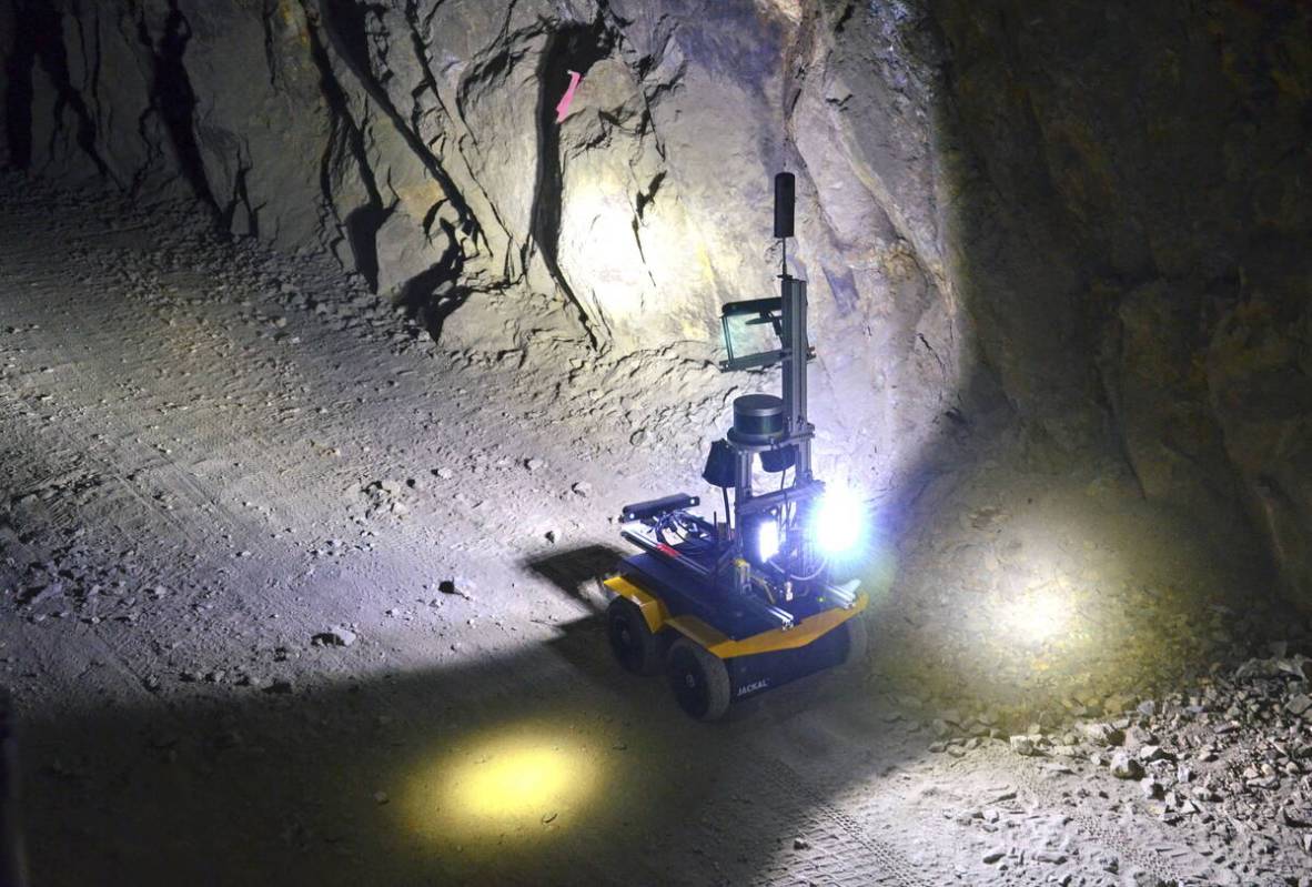 A robot rolls through an underground mine. (AP Photo/Tatiana Flowers)