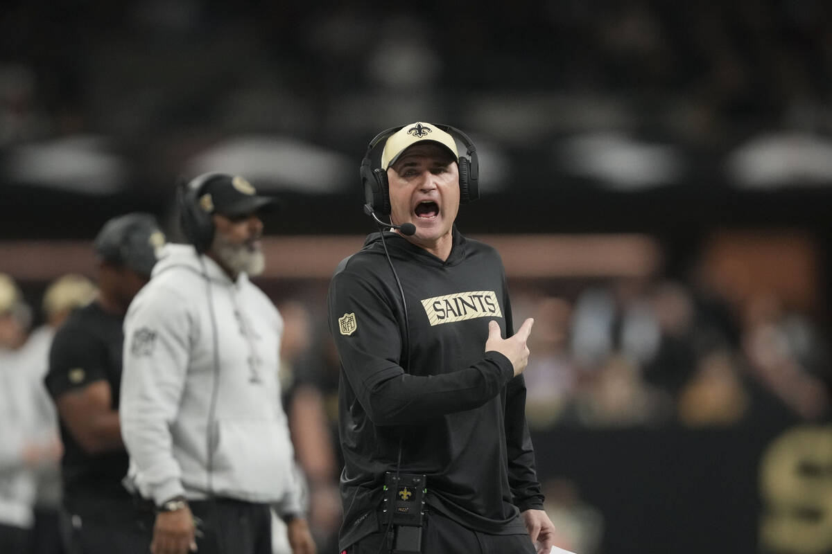 New Orleans Saints interim head coach Darren Rizzi calls out from the bench in the first half o ...