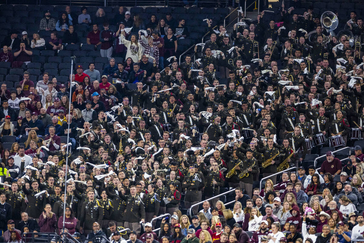 Texas A&M Aggies students and fans cheer on their team against the USC Trojans during the f ...