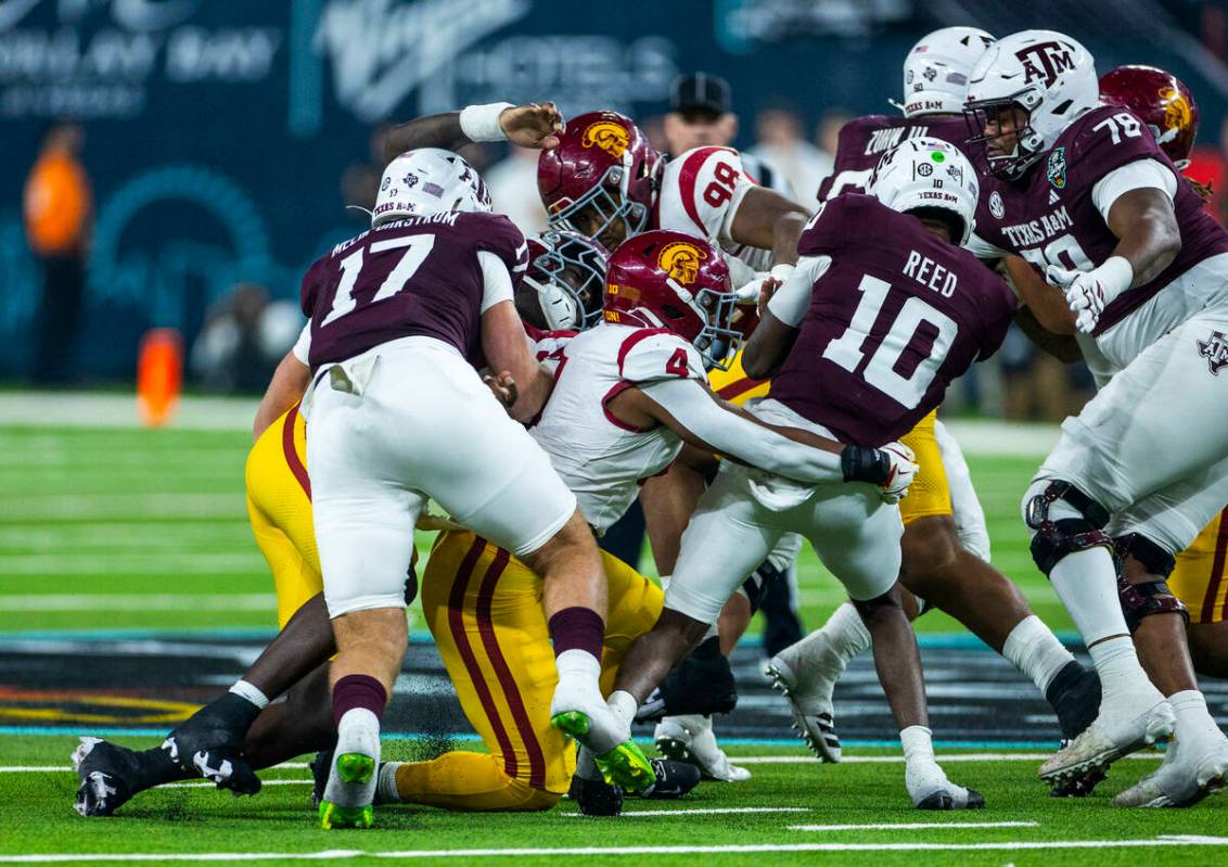 Texas A&M Aggies quarterback Marcel Reed (10) is sacked by USC Trojans linebacker Easton Ma ...