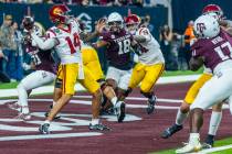 USC Trojans quarterback Jayden Maiava (14) gets off a pass from the end zone as Texas A&M A ...