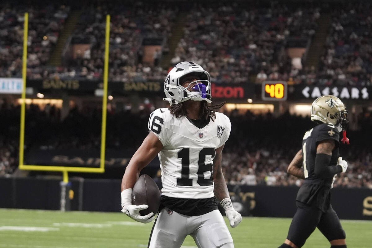 Las Vegas Raiders wide receiver Jakobi Meyers (16) celebrates after catching a 3-yard touchdown ...