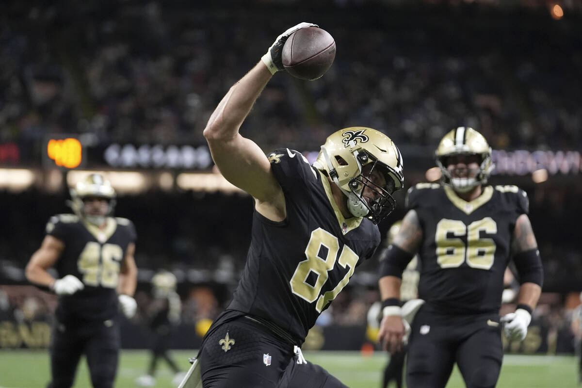 New Orleans Saints tight end Foster Moreau (87) celebrates after catching a 30-yard touchdown p ...