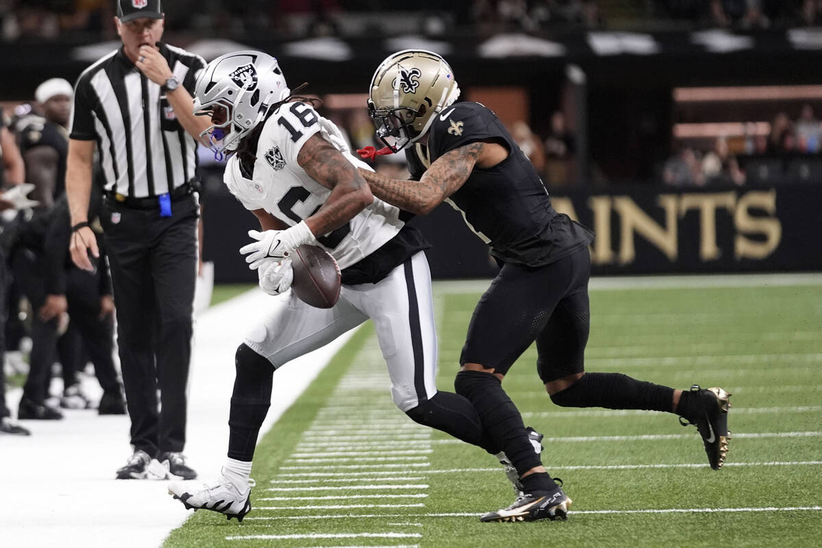 New Orleans Saints cornerback Alontae Taylor breaks up a pass intended for Las Vegas Raiders wi ...