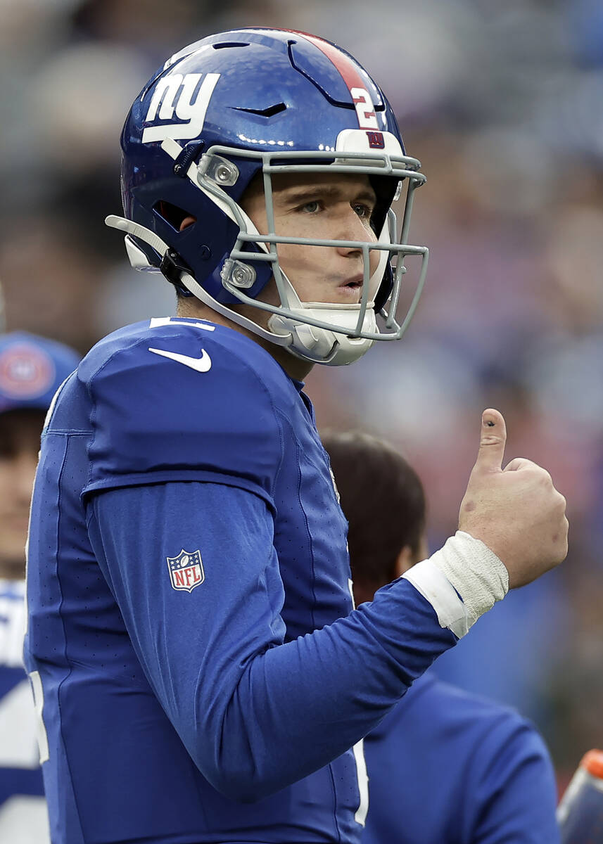 New York Giants quarterback Drew Lock (2) reacts during an NFL football game against the Indian ...