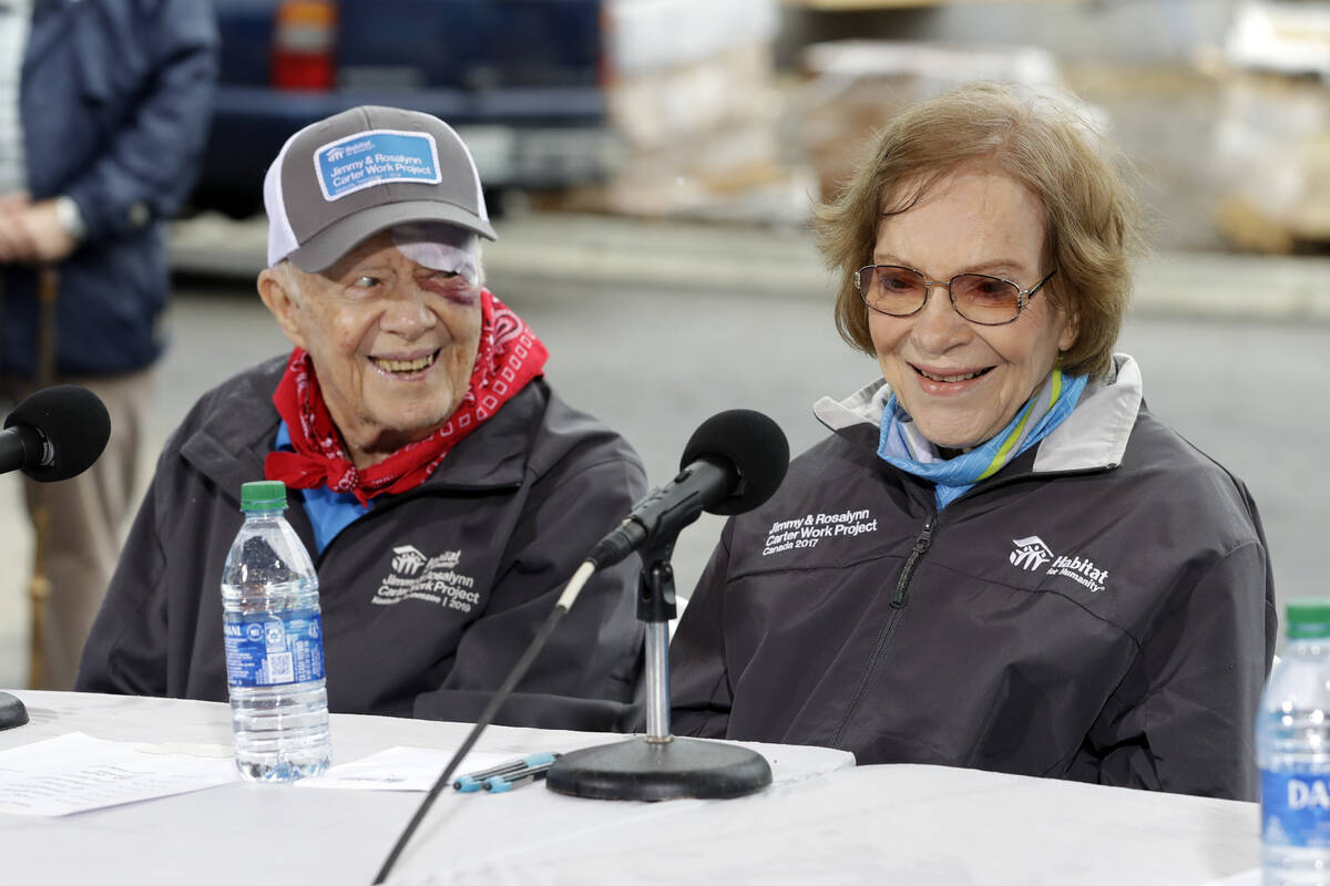 FILE - Former President Jimmy Carter and former First Lady Rosalynn Carter answer questions dur ...