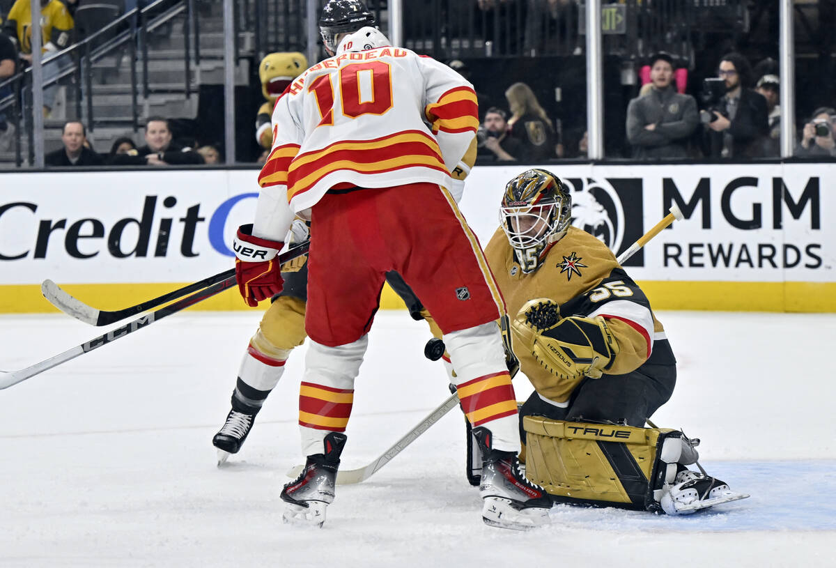 Calgary Flames center Jonathan Huberdeau (10) shoots against Vegas Golden Knights goaltender Il ...