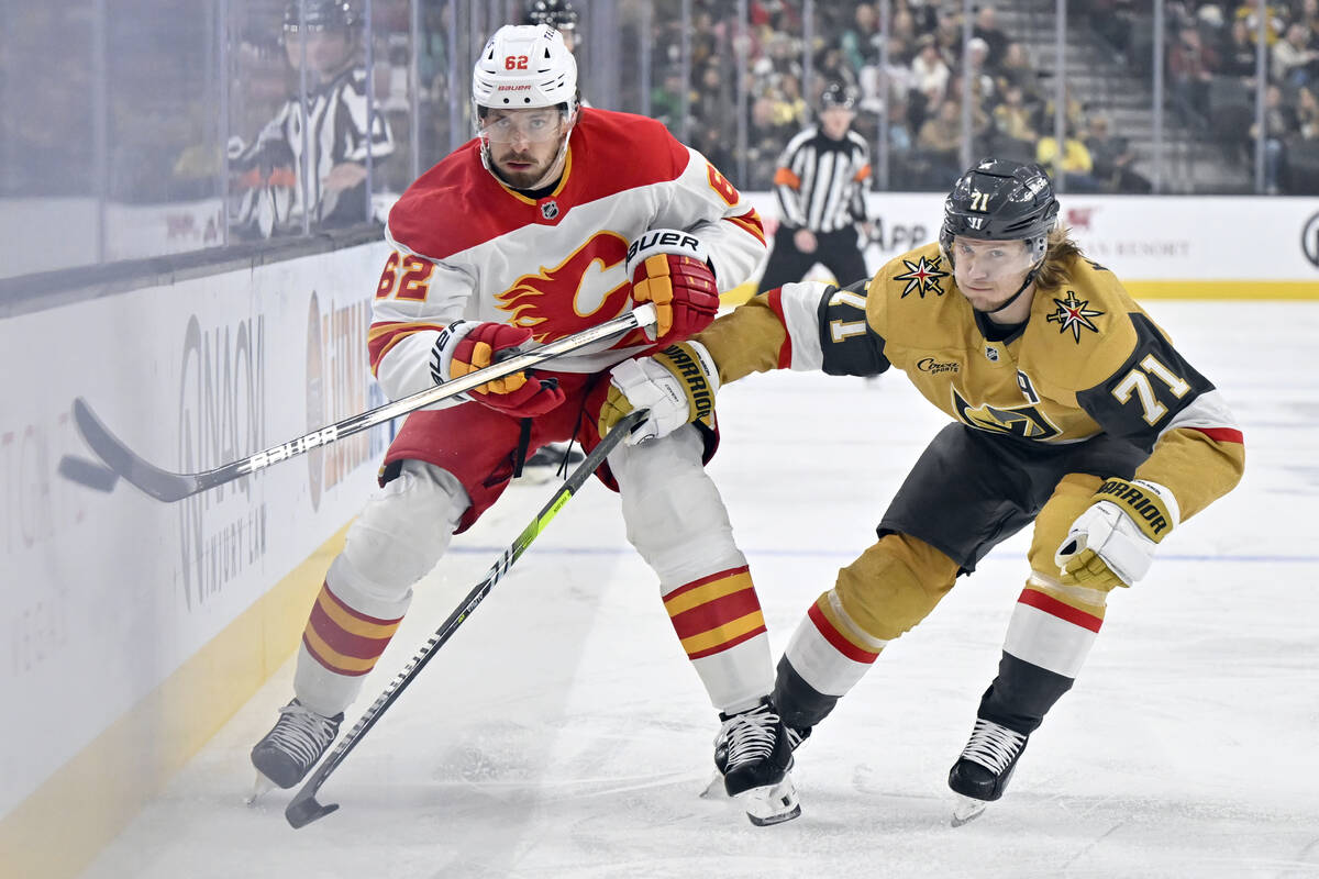 Calgary Flames defenseman Daniil Miromanov (62) and Vegas Golden Knights center William Karlsso ...