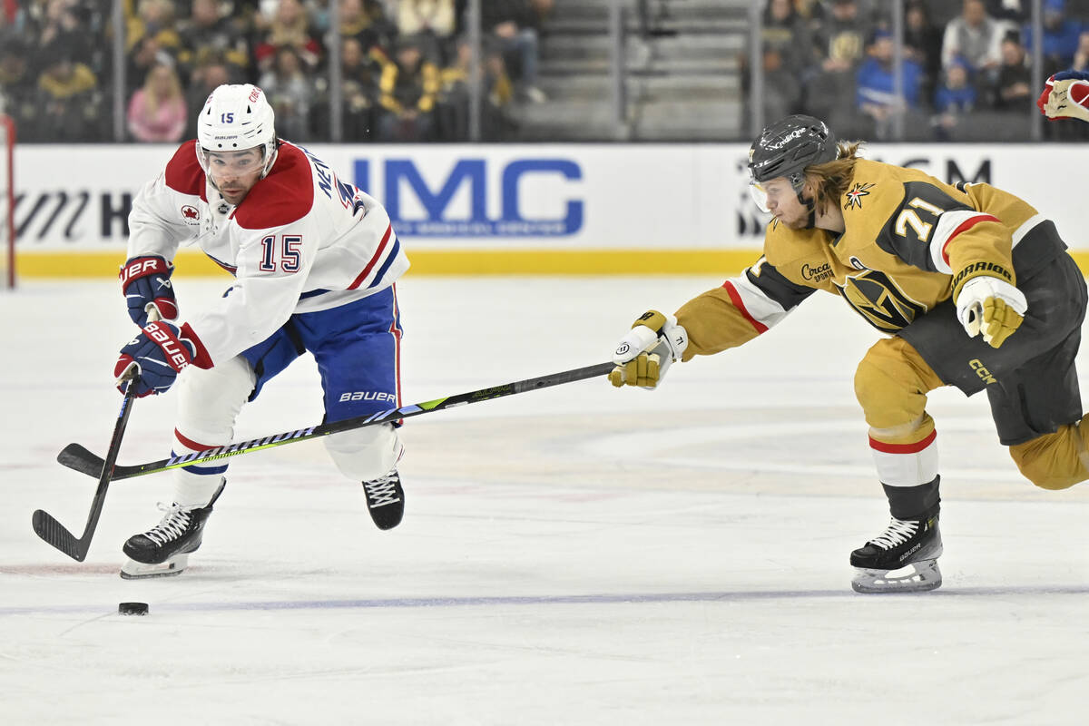 Montreal Canadiens center Alex Newhook (15) and Vegas Golden Knights center William Karlsson (7 ...