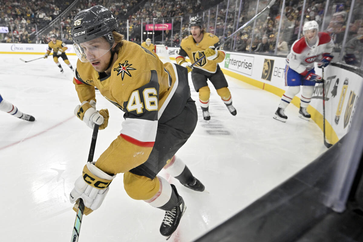 Vegas Golden Knights right wing Jonas Rondbjerg (46) handles the puck along the boards against ...