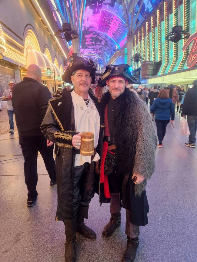 Partiers dressed as pirates join the New Year's Eve festivities on Fremont Street. (Jessica Hil ...