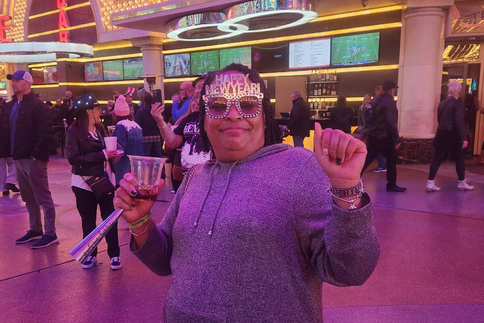 Jamie Peagler of Dayton, Ohio, celebrates on the Fremont Street Experience. (Jessica Hill/Las V ...