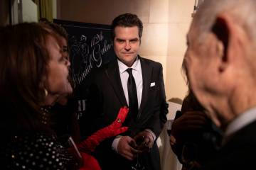 Former Rep. Matt Gaetz, R-Fla., center, attends the cocktail hour of the New York Young Republi ...