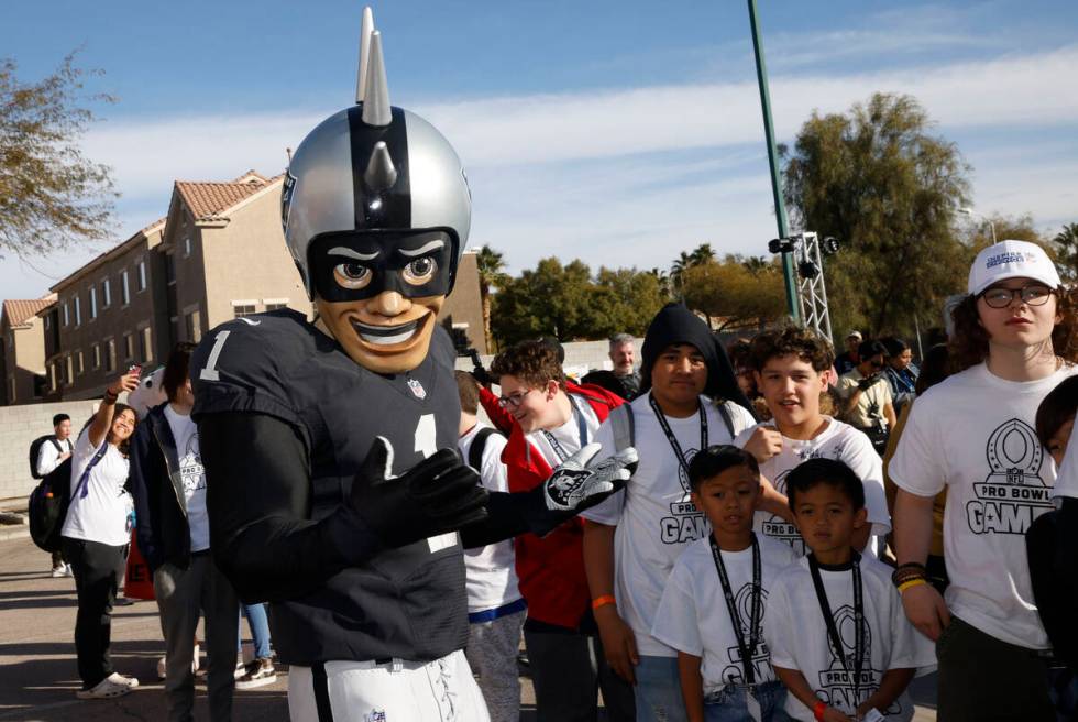 Raiders mascot Raider Rusher performs, Friday, Feb. 3, 2023, during a community event to refurb ...