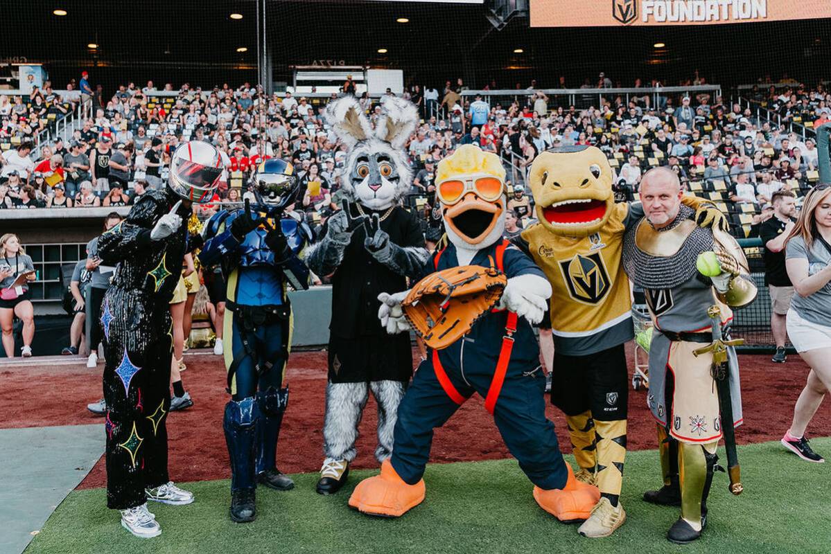 Mascots Chance, Stomper, Spruce the Goose and Aviator take a photo at the fifth annual Battle f ...