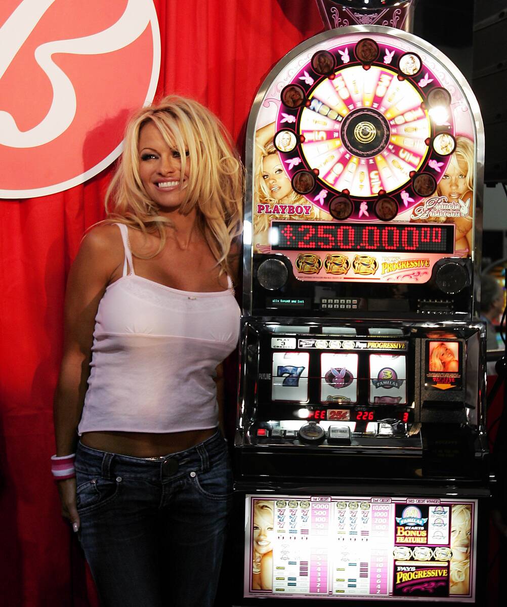 Actress Pam Anderson appears at the Bally's booth during the Global Gaming Expo at the Las Vega ...