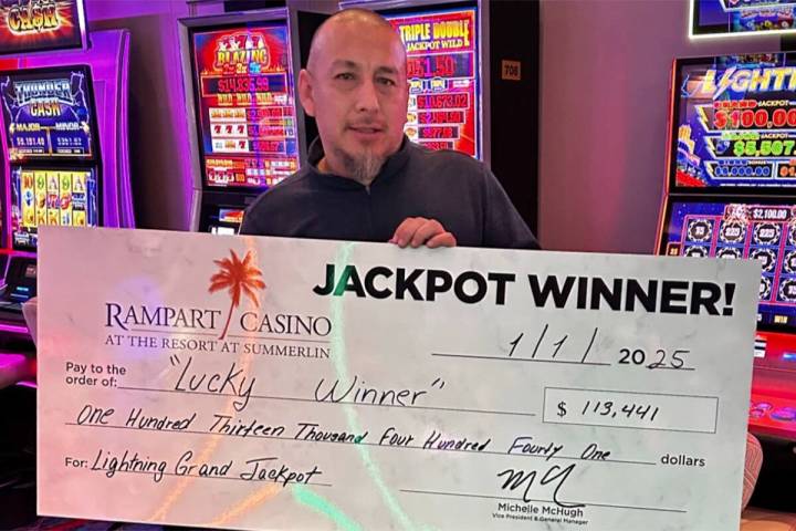 William V. of California celebrates his $113,411 Grand Jackpot win on the Lightning Link slot m ...