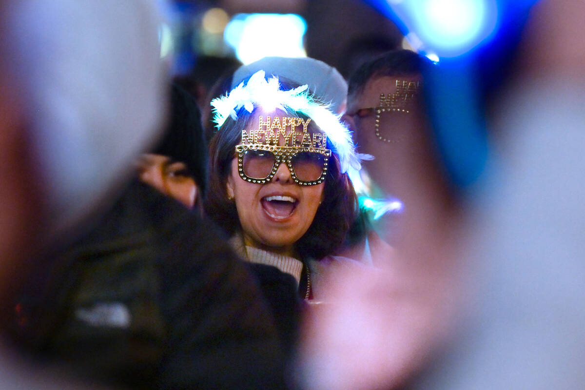 Revelers celebrate New Year’s Eve on the Strip Tuesday, December 31, 2024, in Las Vegas. ...