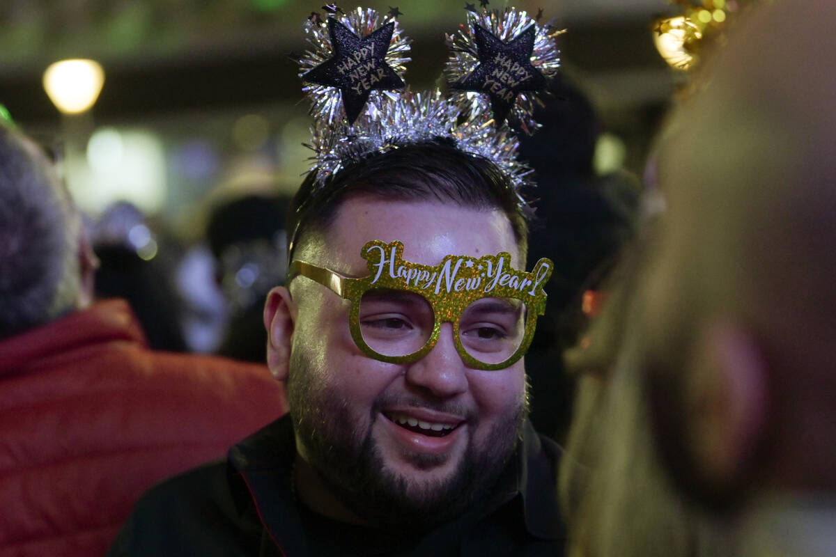 A reveler celebrates New Year’s Eve on the Strip Tuesday, December 31, 2024, in Las Vega ...