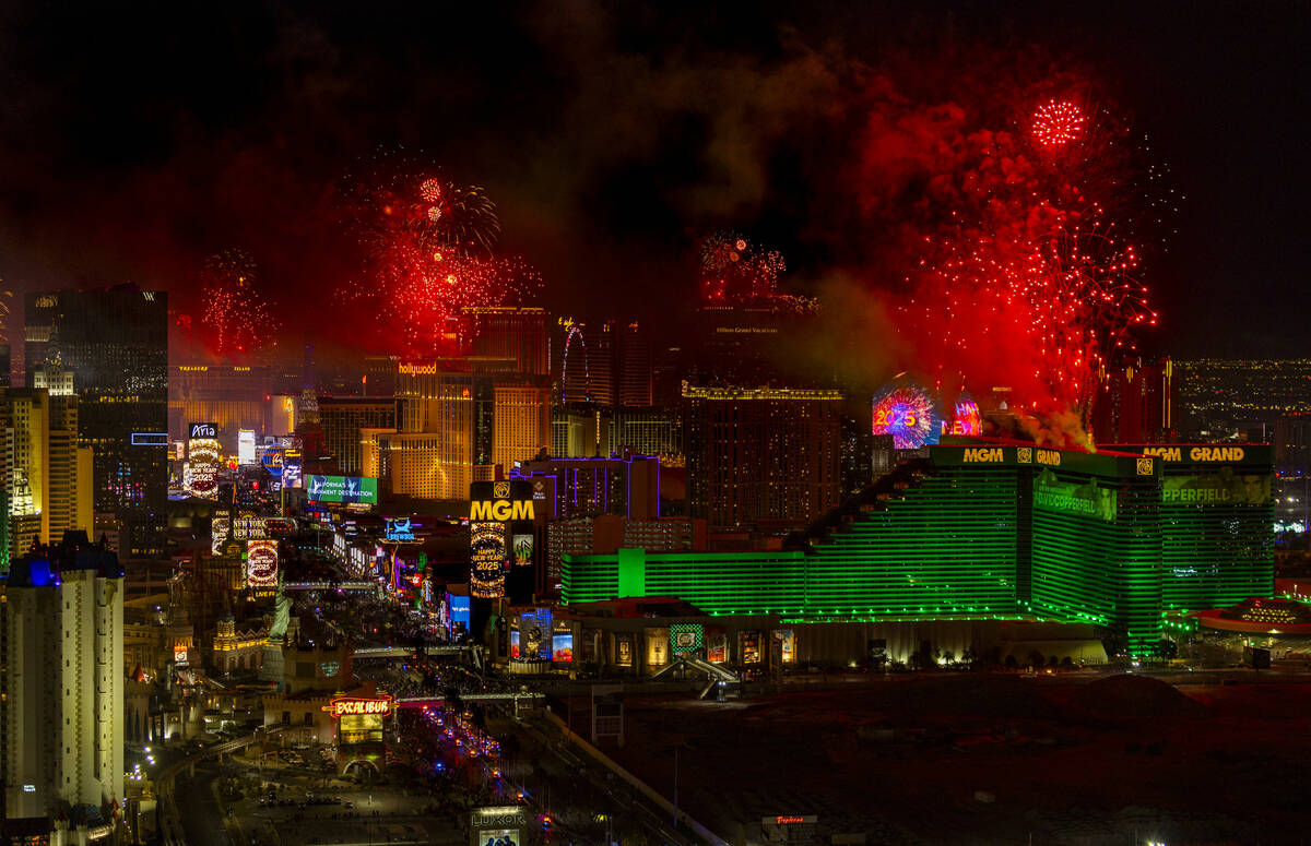 Fireworks erupt over the Strip as part of New Year's Eve celebrations across the city as viewed ...