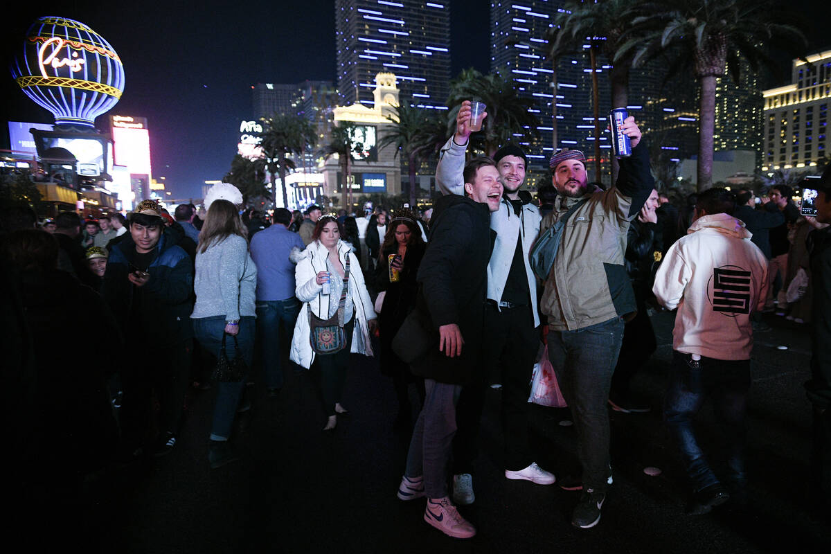 Revelers celebrate New Year’s Eve on the Strip Tuesday, December 31, 2024, in Las Vegas. ...